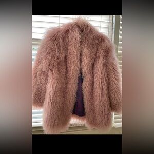 Jacket made of natural llama fur.